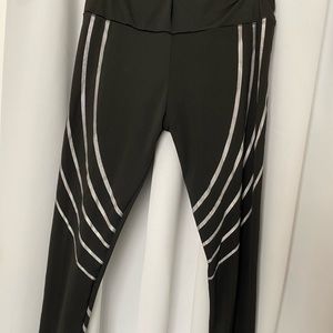 Black leggings with a reflective design